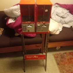Boys Enjoy Candy And Toy Machines From The Late 50s