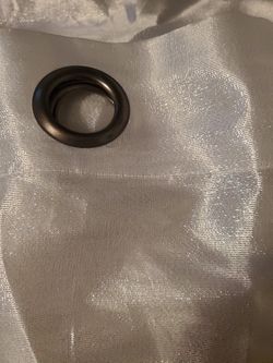 Beautiful sheer curtains. Silvery white color 32 in wide 84 inch long. 1 panel cover a standard size window.