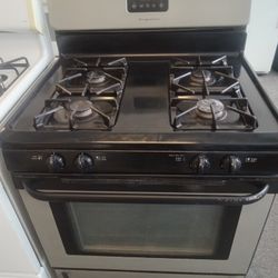 Black and stainless natural gas stove with warranty 