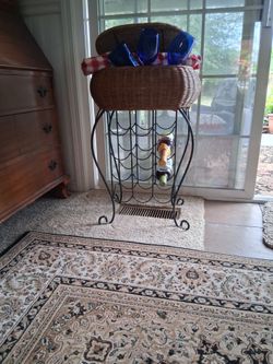 Wine holder with basket on top