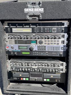 Rack on wheels for Mixer on top and 12 spaces for components , processors