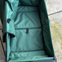 green big wheel wagon