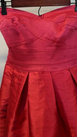 Fuschia strapless cocktail dress.