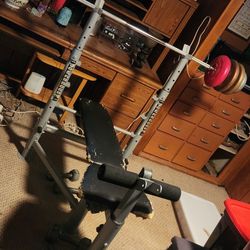 Weight Bench + Barbell + Extra Weights