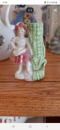 Vase of a Victorian young girl & a corn cob