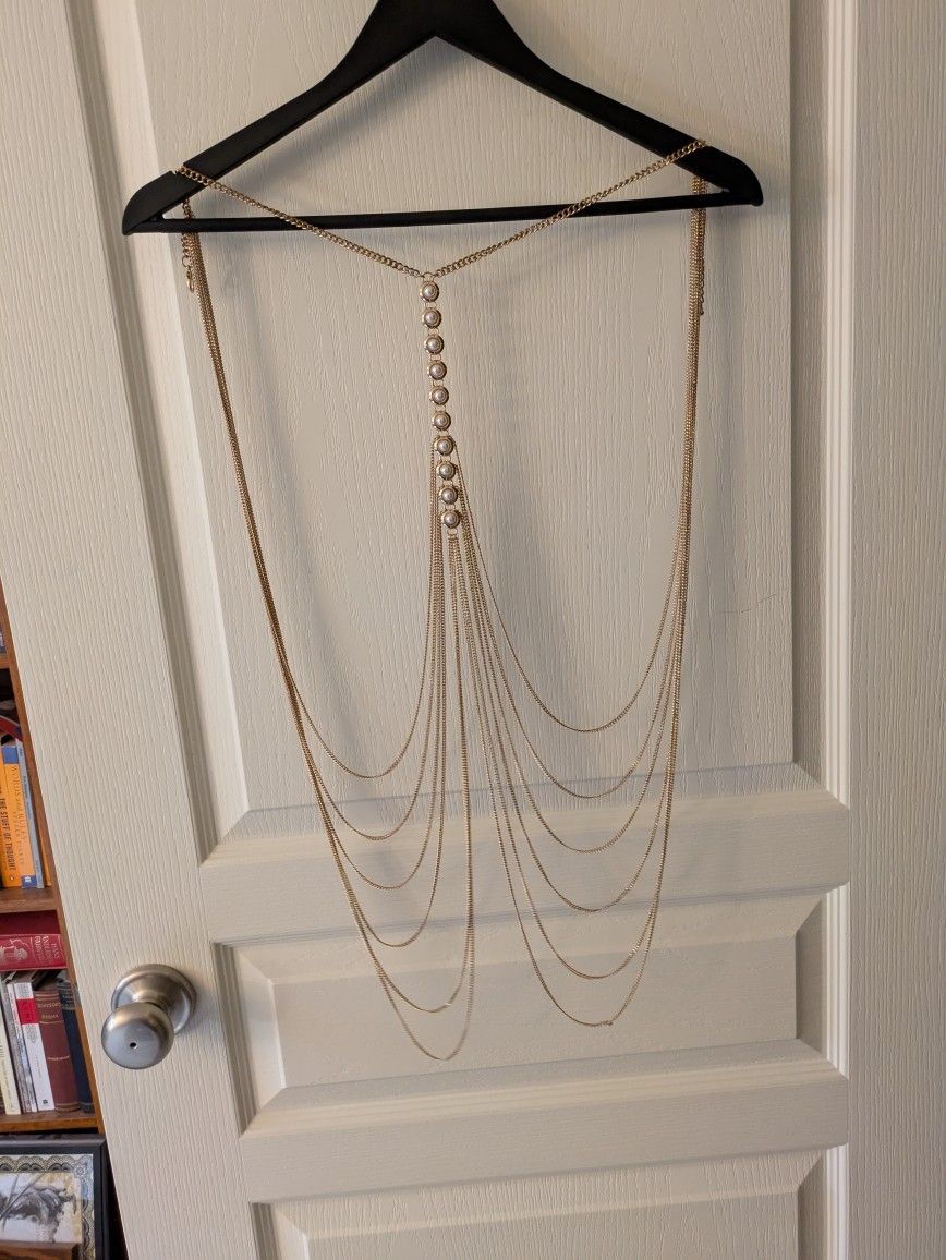 Women's gold body chain