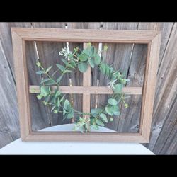19 1/4in  x 23 1/2in Farmhouse Wall decor art framed with small whited flowers surrounding a beautiful leafy vine.  Can be hung with wise or lengthwis