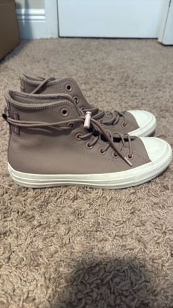 Purple Converse shoes