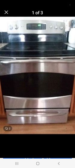 Very nice GE digital glass cooktop oven with Convection, warming drawer and more. Stainless/Black. I recently upgraded to an all Stainless kitchen pac