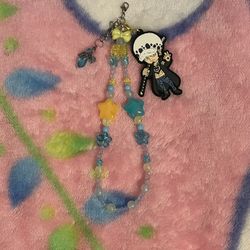Cute blue and yellow phone charm