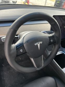 Steering wheel re-upholstery Tesla