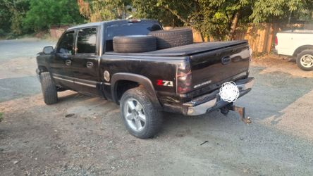 2004 black Chevrolet Silverado 1500 Z71 Extended Cab – Lifted