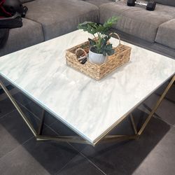 Coffee table with metal base