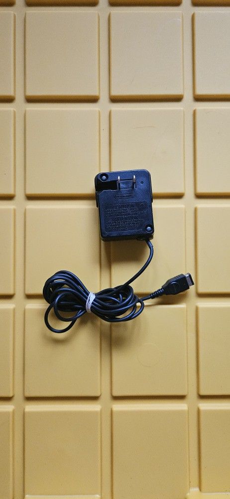 Nintendo DS Original NTR-001 and Advance Sp Charger 
