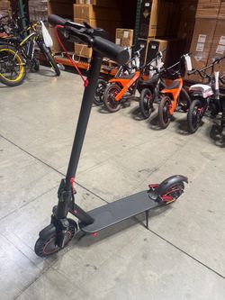 Front and rear shock-absorbing electric scooters