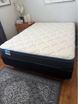 Queen bed and frame, rarely used