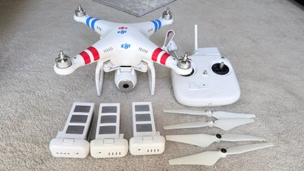 Dji Phantom vision+ w/remote and range extender +3 batt