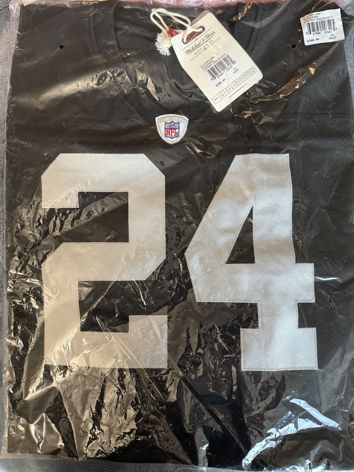LA Raider’s Charles Woodson 2002 Mitchell & Ness Throwback Jersey