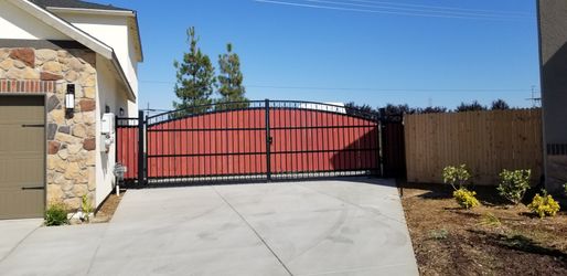 Custom steel gates with integrated rustic wooden planks