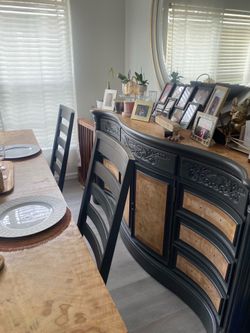 Dining table and buffet sets featuring black legs and warm wood tops