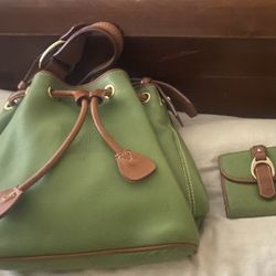 Dooney And Bourke set including green bag and wallet
