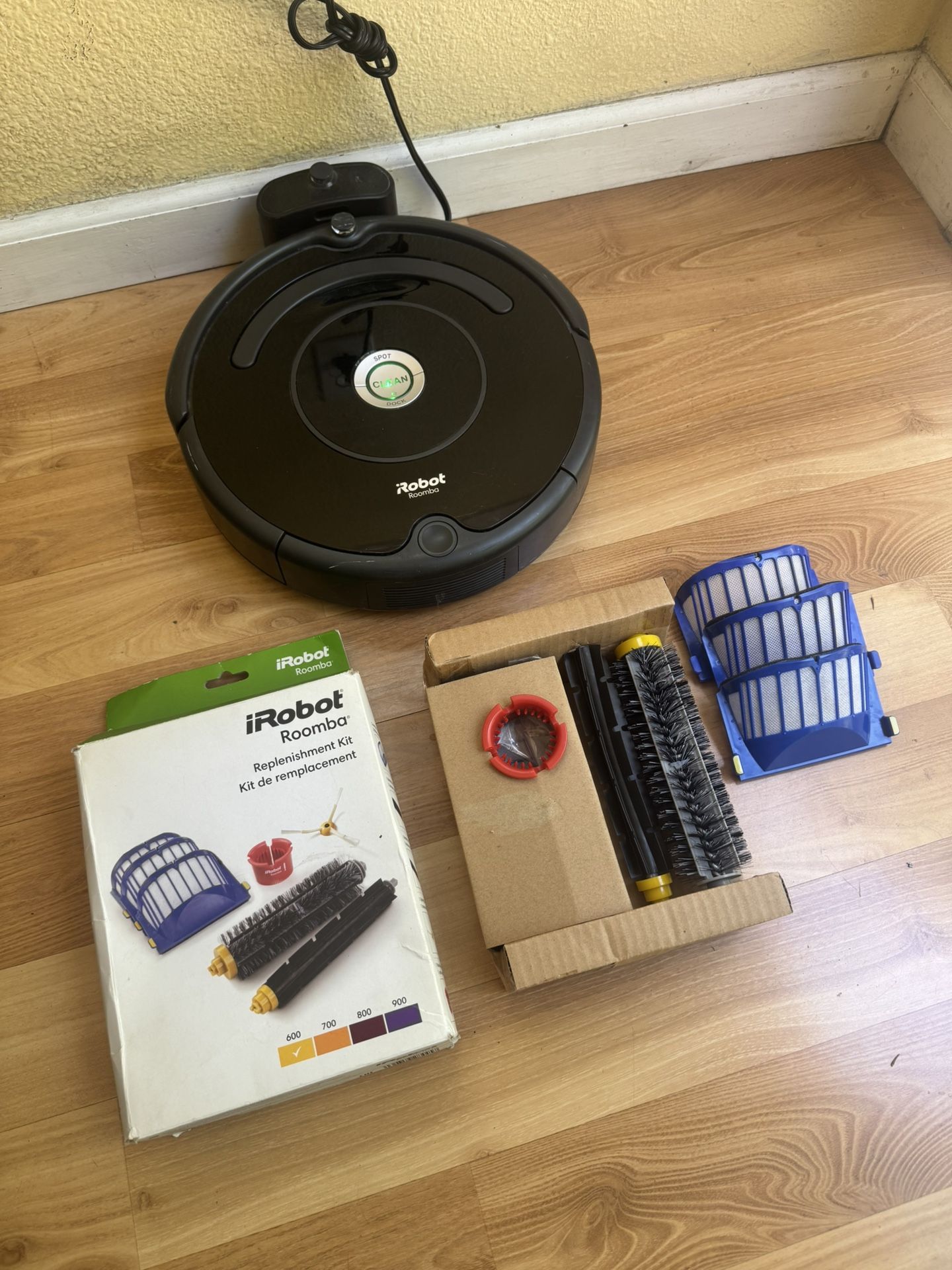 iRobot Roomba vacuum cleaner with extra replacement kit