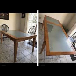 Beautiful pull out leaf glass top table 