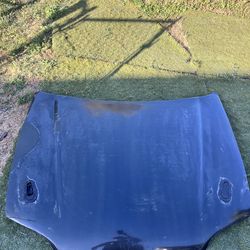 Carbon fiber hood for Honda Civic EG (1992–1995).