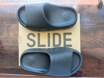 Brand new Yeezy slides  black size 4