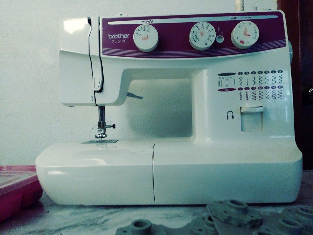 Sewing machine with attachments