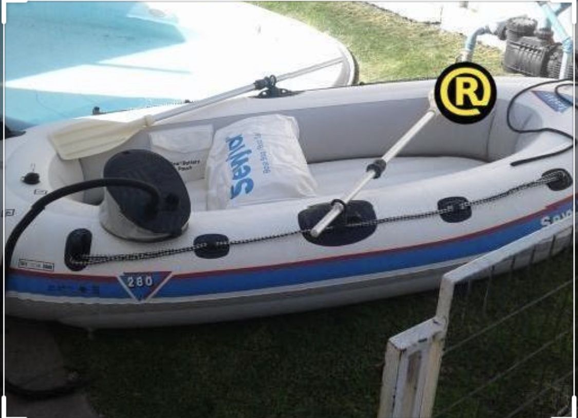 $40 Sevylor inflatable boat with oars and pump