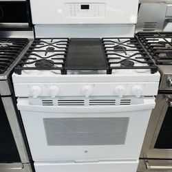 GE natural gas stove (white)—includes a receipt for a 60-day warranty