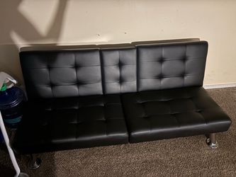 Two Black futon couch
