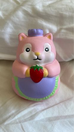 Hamster with a mini berry squishie ;)