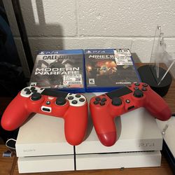 PS4 Pro With Controllers And Games 