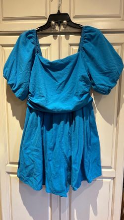 Size XL blue cotton short romper has side pockets and poofy short sleeves