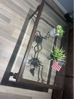 Glass and metal coffee table