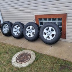 4 jeep tires and rims 