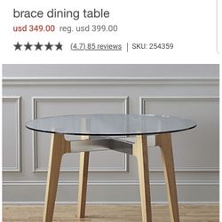 CB2 round glass dining table