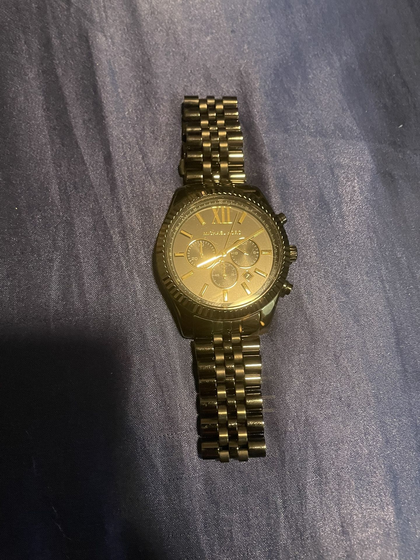 Michael Kors Black and gold watch