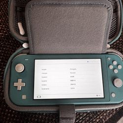 Switch Lite With 2 Games,carrying Case And 32gb Of Extra Storage (PLEASE READ DESCRIPTION)