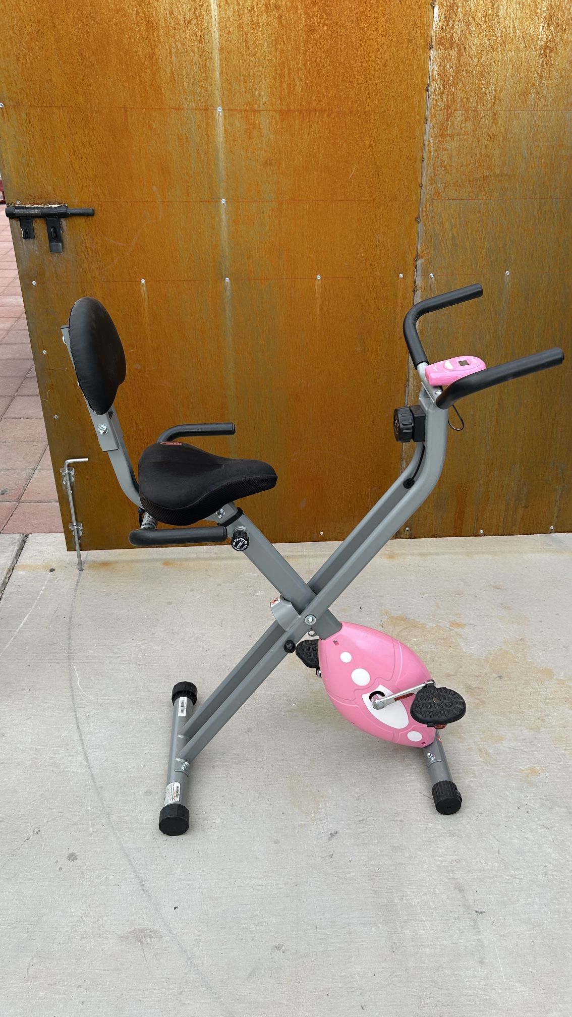 Sunny Health & Fitness Pink Foldable Magnetic Exercise Bike,