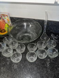 Beautiful glass punch bowl set with 12 matching glass punch cups