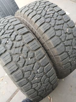 Used pair of tires 275 70 18 lt