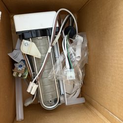 NIB New Universal Icemaker With Bin. 