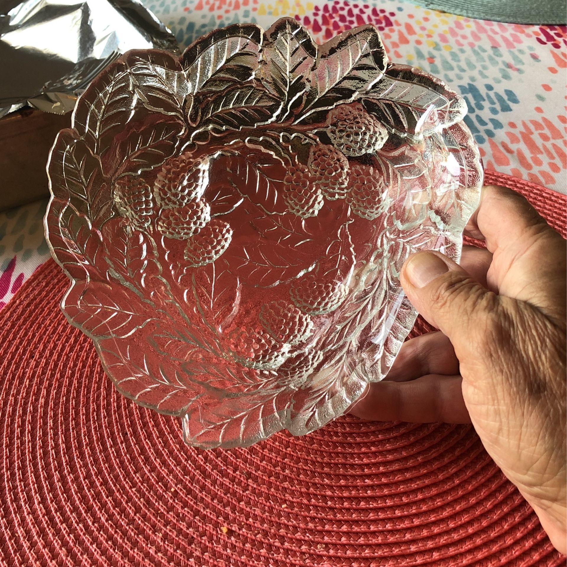 Vintage glass candy dish with raspberries