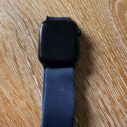 Apple iWatch Series 6, 44mm, aluminum case with elastic band. Charging chord included.