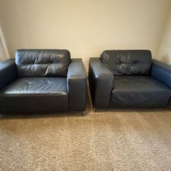 Two  Wide Leather Chairs 