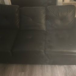 Black leather sofa