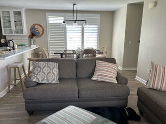 Two Brown tweed couches